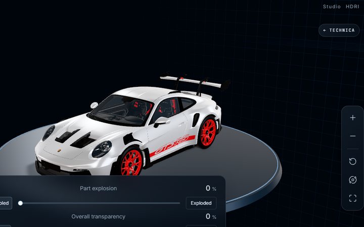 The Porsche 911 GT3 RS studio: the full car on a turntable with its rear wing raised.